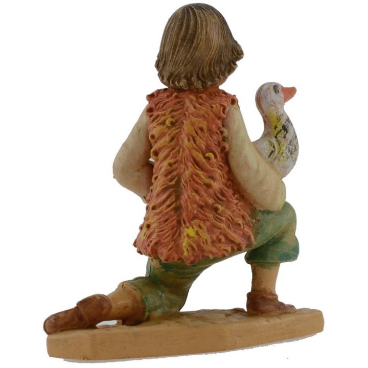Niño arrodillado con ganso serie lux 10 cm