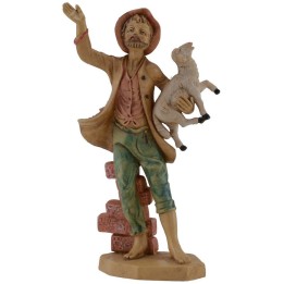 Hombre sentado en el muro con cordero en brazos serie lux cm 16