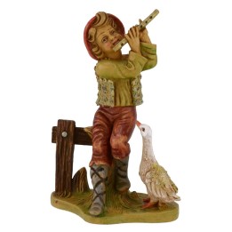 Niño sentado con flauta en pvc lux serie 12 cm