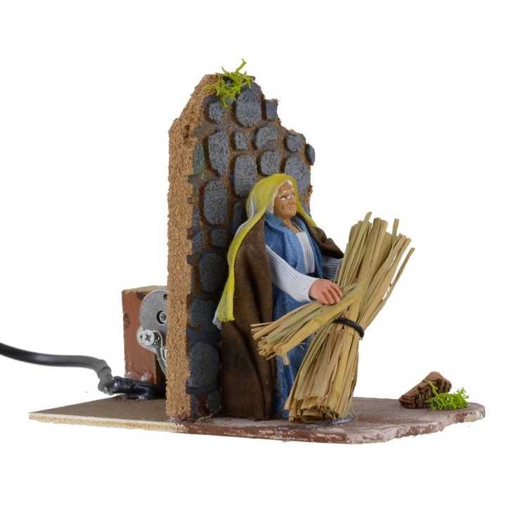 Campesino oriental con haces de paja serie 8 cm en movimiento