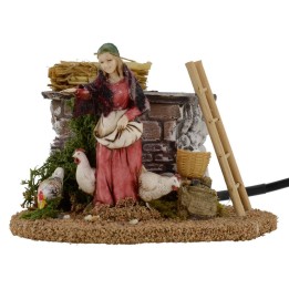 Campesina y gallina con doble movimiento serie 10 cm Landi belén