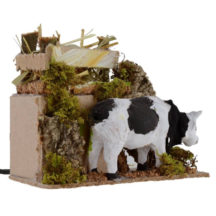 Bue eating in motion cm 14x9x12 h