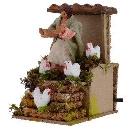 Donna che ciba le galline in movimento 10 cm