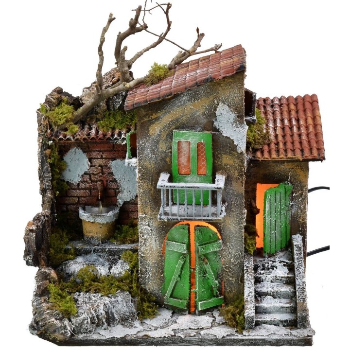 Illuminated house with functioning fountain cm 30x21x35 h