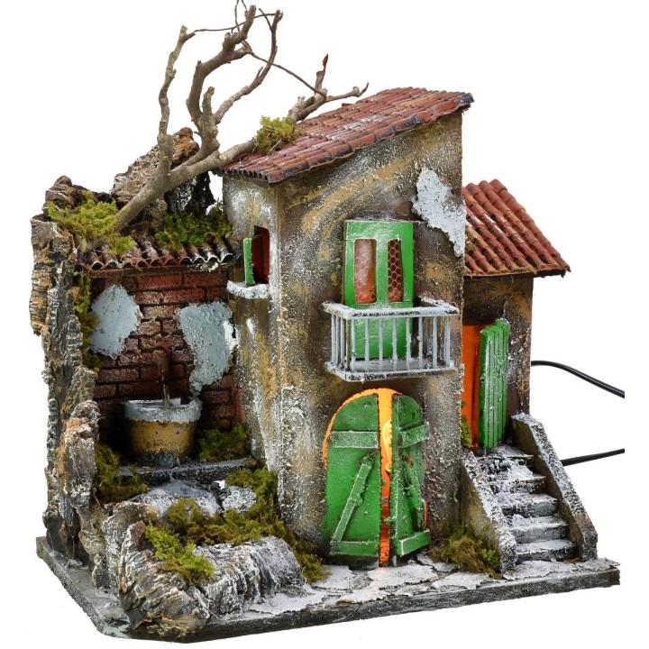 Casa illuminata con fontana funzionante cm 30x21x35 h