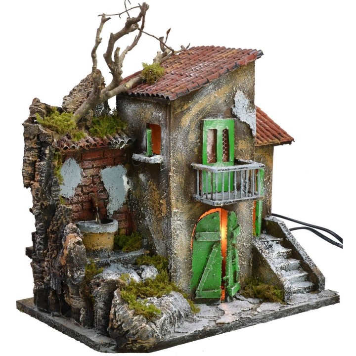 Casa illuminata con fontana funzionante cm 30x21x35 h