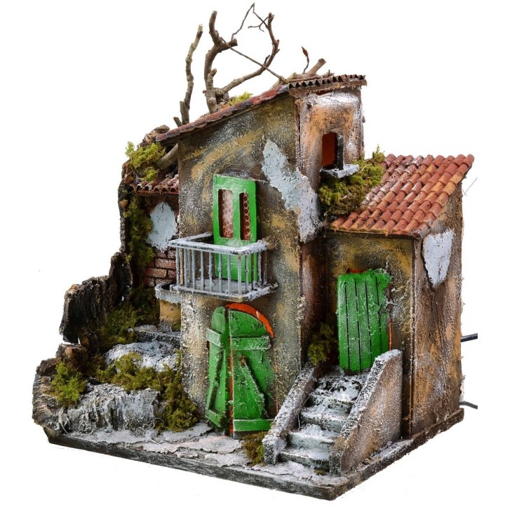 Casa illuminata con fontana funzionante cm 30x21x35 h