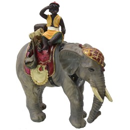 Chico sobre elefante serie 12 cm en resina