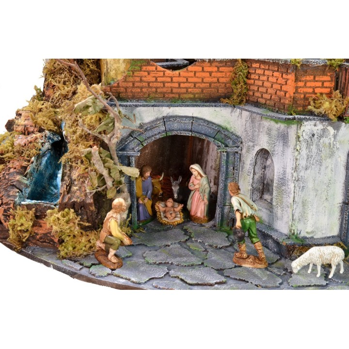 Complete nativity scene with Landi statues, working lights, and waterfall