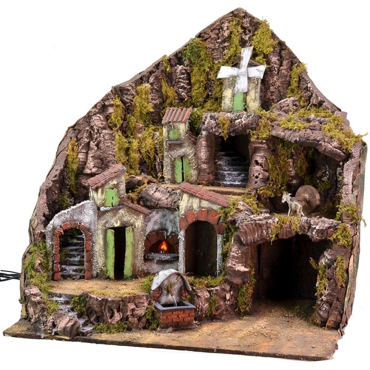 Illuminated nativity scene with functioning fountain, fire, and mill cm