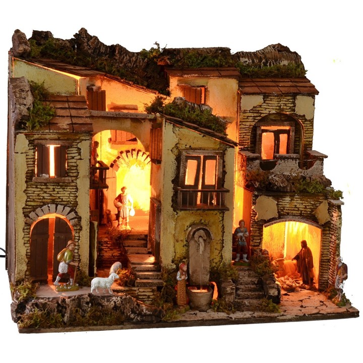 Pesebre iluminado completo con estatuas Landi y fuente