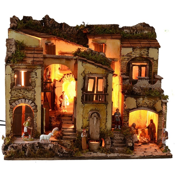 Pesebre iluminado completo con estatuas Landi y fuente