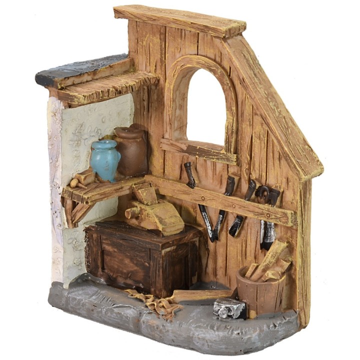 Carpenter's workshop in resin 8,7x4,5x10,5 h cm.