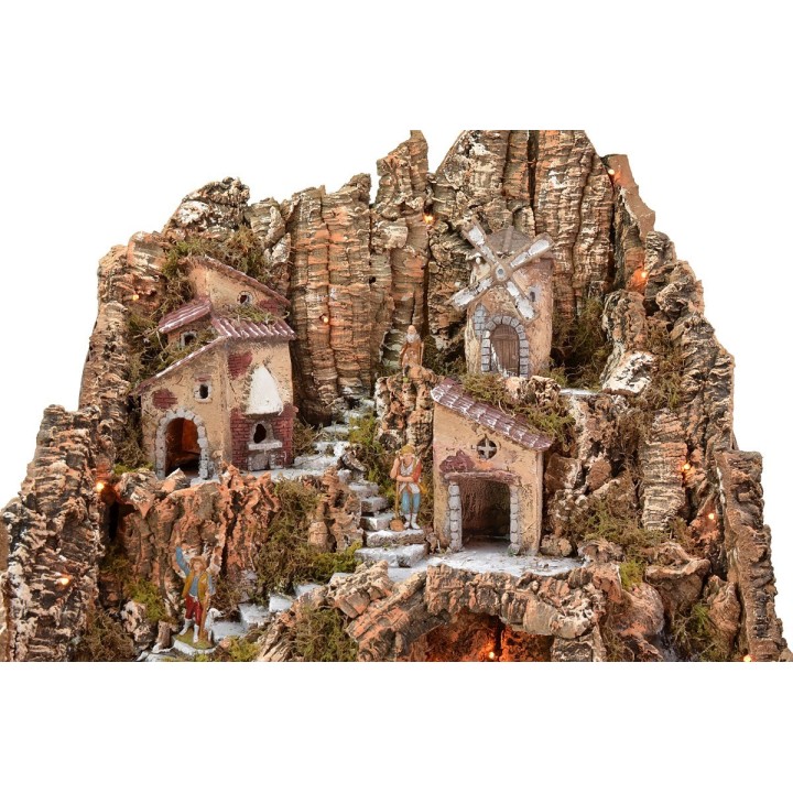 Illuminated nativity scene complete with Landi statues and windmill
