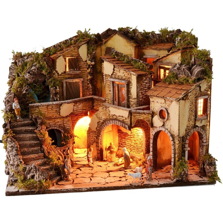 Illuminated nativity scene complete with Landi statues and waterfall