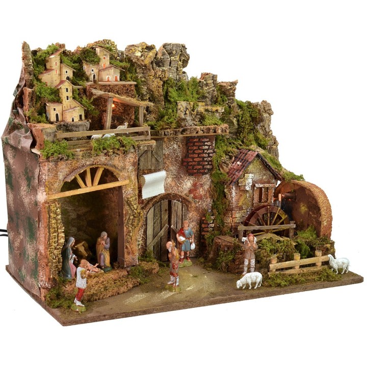 Illuminated nativity scene complete with Landi statues and water mill