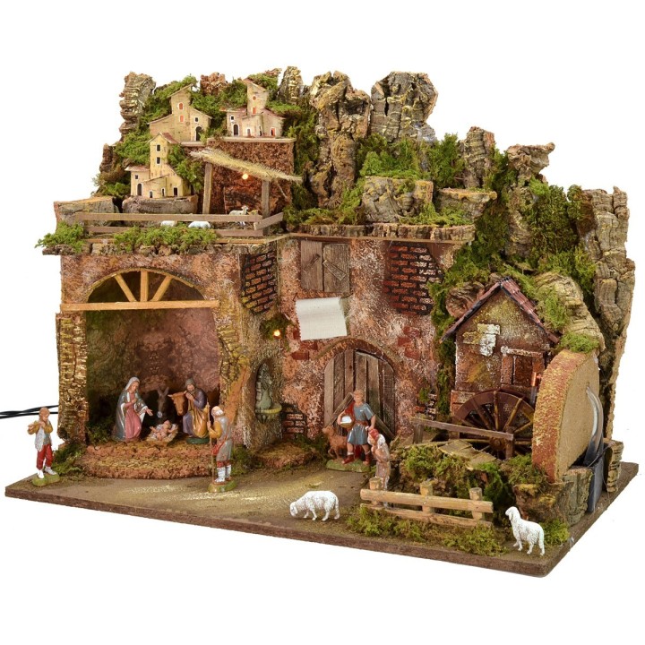 Nacimiento iluminado completo con estatuas Landi y molino de agua