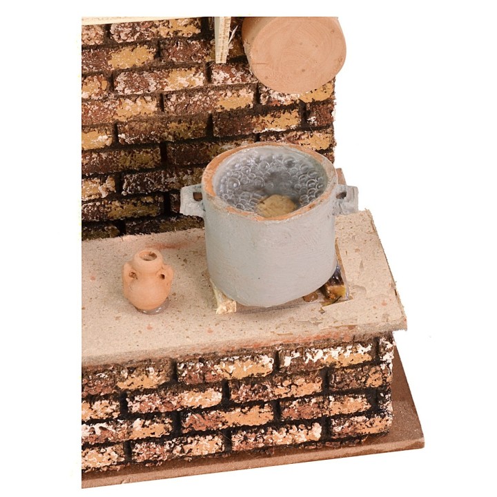 Cocina con olla que hierve y fuego cm 13,5x17x21 h.