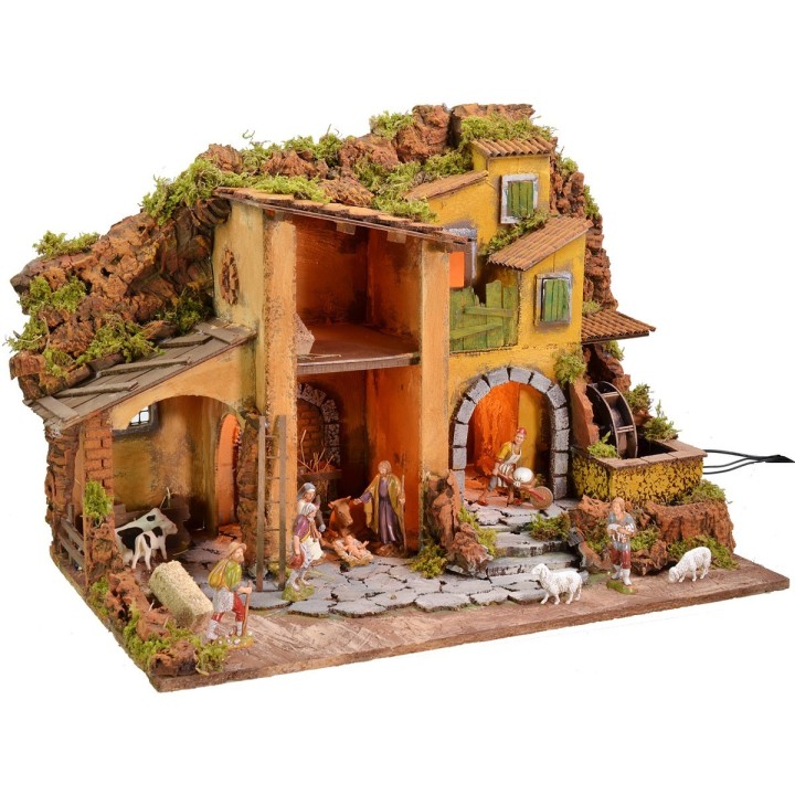 Illuminated nativity scene complete with Landi statues and water mill