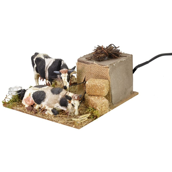 Mucche in movimento che mangiano cm 15x15x7 h