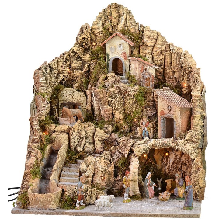 Pesebre iluminado con burro en el molino completo con estatuas