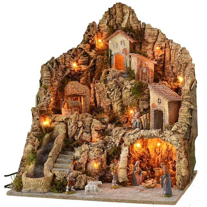 Pesebre iluminado con burro en el molino completo con estatuas