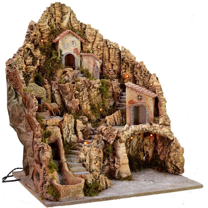 Presepe illuminato con cascata funzionante e asino alla macina