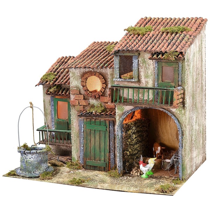 Casita de campo iluminada a corriente con animales y pozo cm