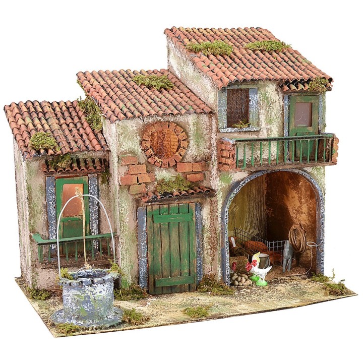 Casita de campo iluminada a corriente con animales y pozo cm