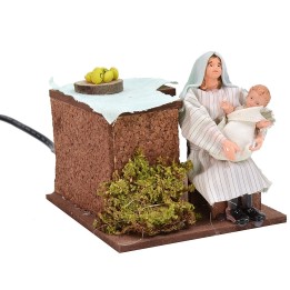Donna araba serie 12 cm che ninna il bambino in movimento