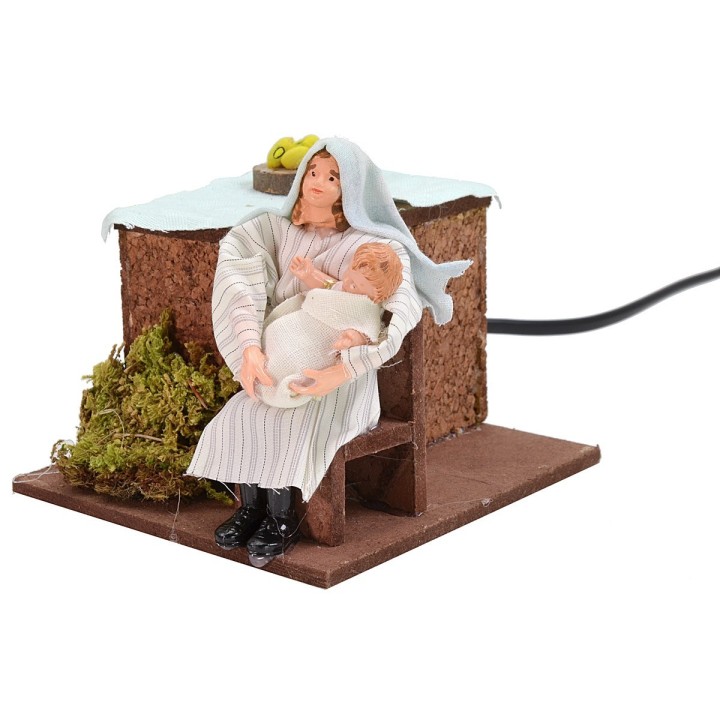 Donna araba serie 12 cm che ninna il bambino in movimento