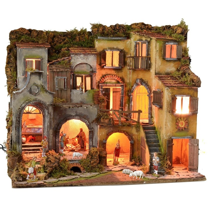 Illuminated Neapolitan nativity scene complete with Landi statues