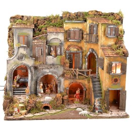 Illuminated Neapolitan nativity scene complete with Landi statues