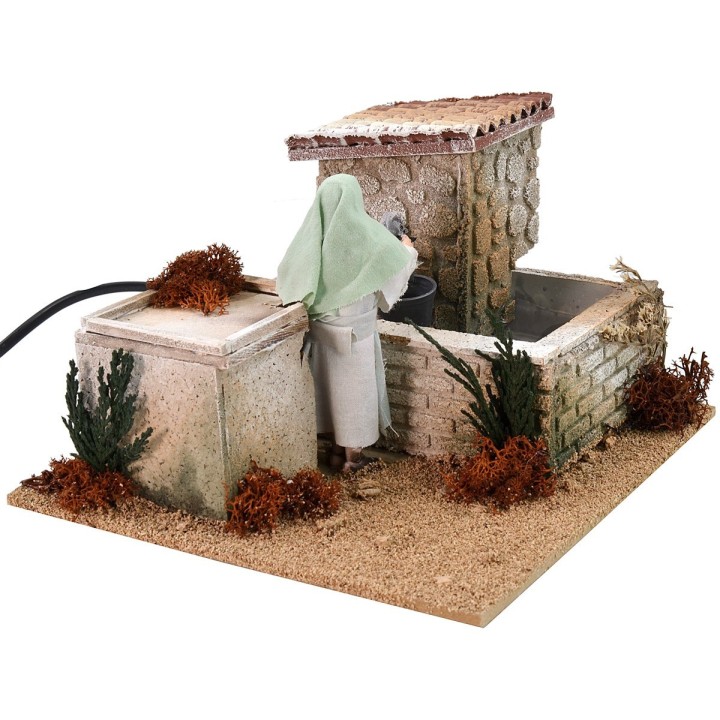 Donna alla fontana 12 cm in movimento cm 20x20x13,5 h
