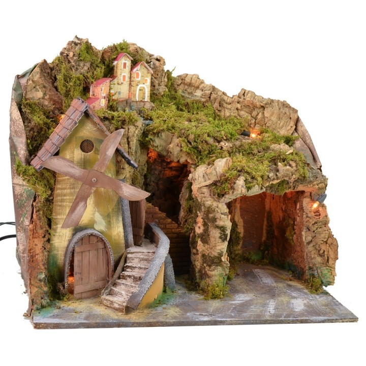 Paesaggio illuminato con grotta e mulino funzionante a corrente