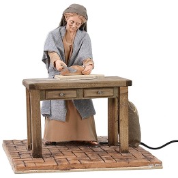 Oriental woman slicing bread in motion 30 cm