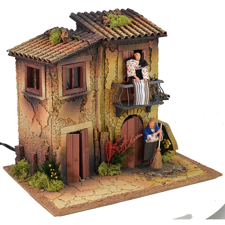 Pueblo iluminado para belén con doble movimiento de 40x30x35 cm