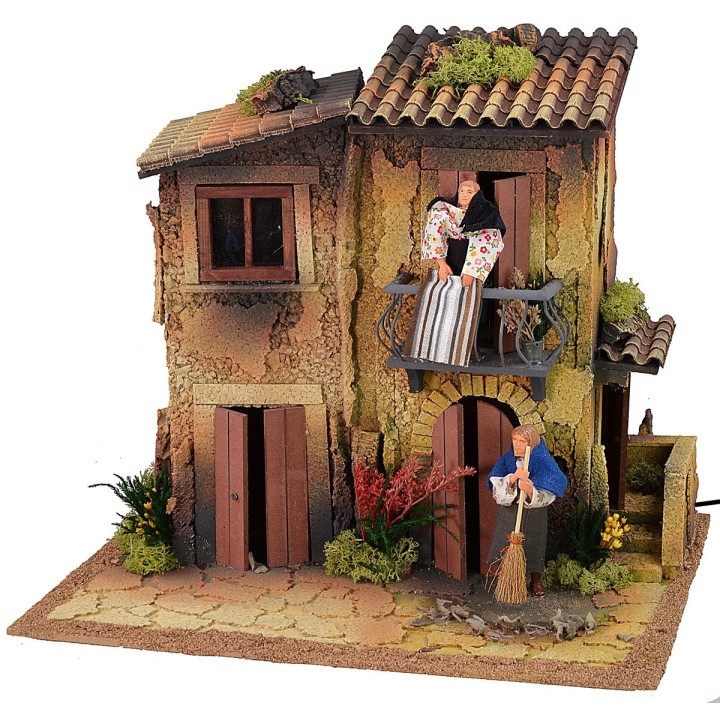 Pueblo iluminado para belén con doble movimiento de 40x30x35 cm