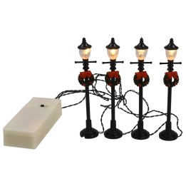 Coloca 4 farolas negras con guirnalda decorativa a batería de