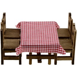 Mesa de madera de 8x6x4,2 cm de altura con 4 sillas.