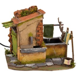 Casa con stenditoio gocciolante e fontana funzionante cm