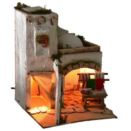 Casa araba illuminata con bottega della sarta cm 25x25x31,5 h