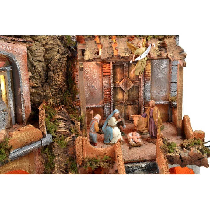 Presepe illuminato con cascata funzionante completo di statue
