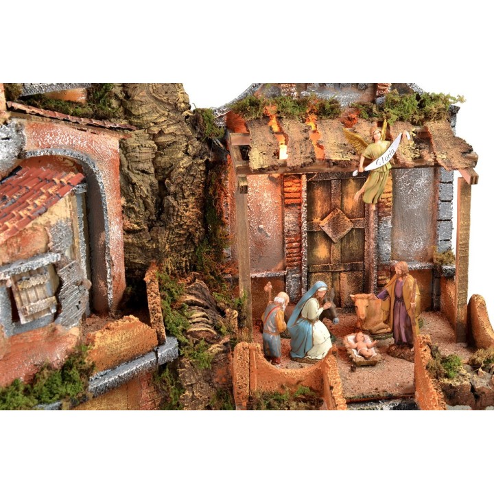 Illuminated nativity scene with working waterfall complete with statues