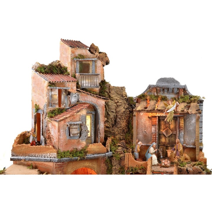 Illuminated nativity scene with working waterfall complete with statues
