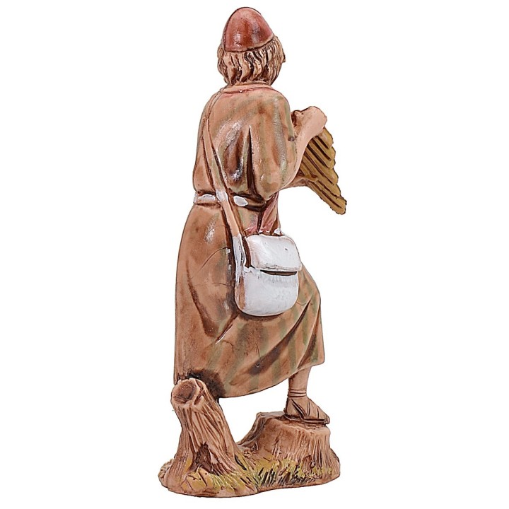 Pan flute player 6,5 cm cost. 