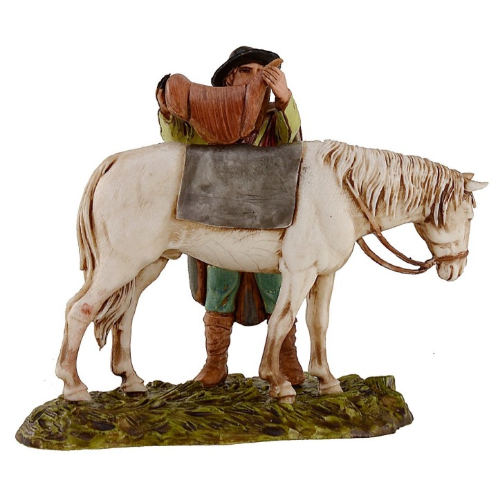 Hombre que ensilla el caballo escena 10 cm Landi Moranduzzo