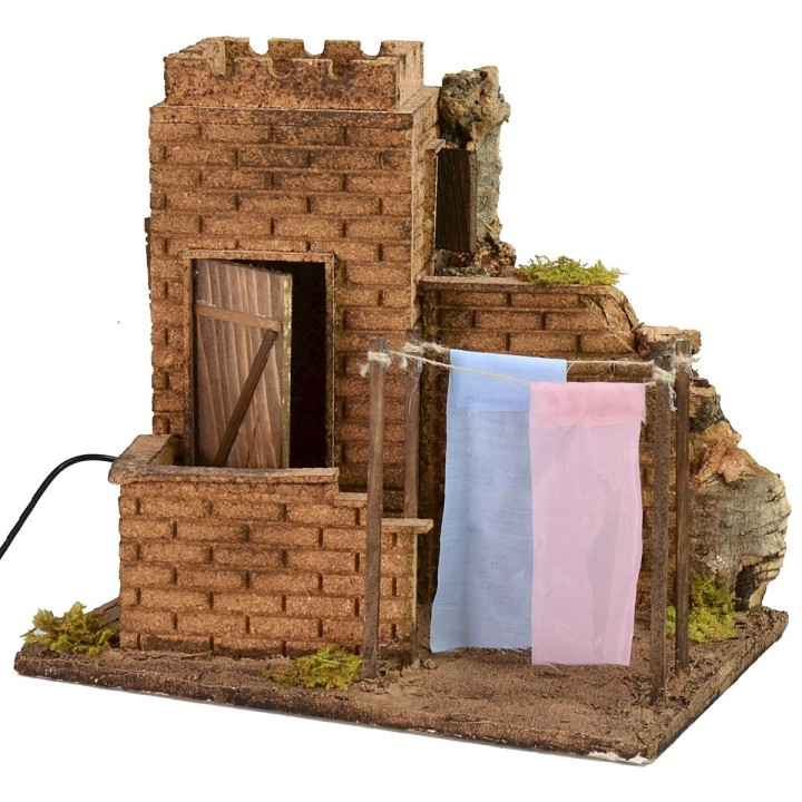 House with clothes hanging wind effect cm 27x19x24,5 h.