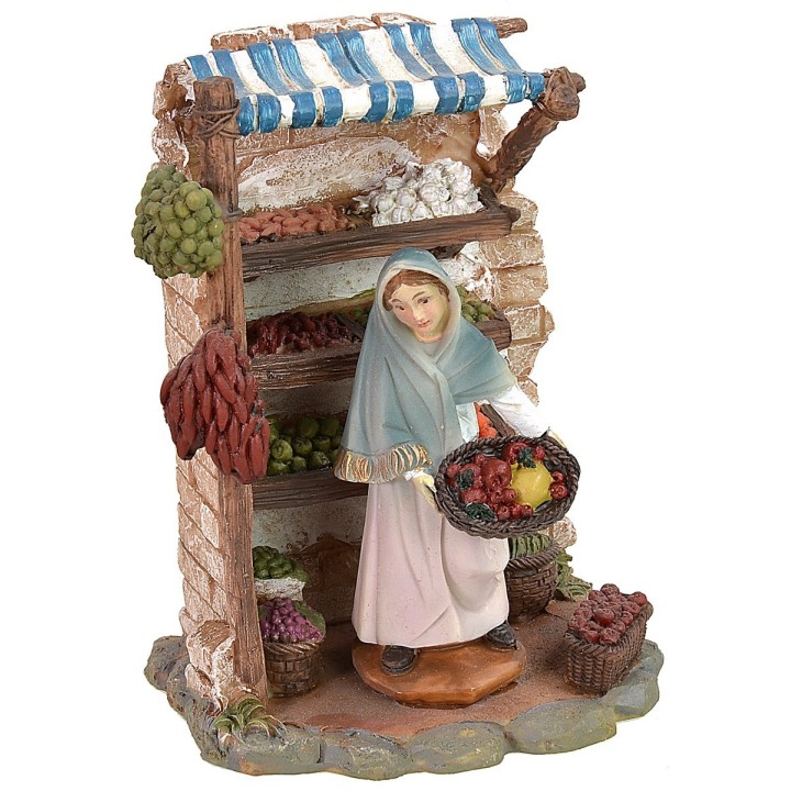 Tienda en resina con vendedora de frutas cm 12,5x8,5x16,5 h