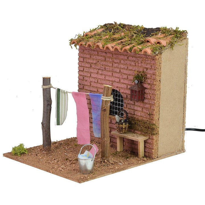 Tendedero con ropa ondeando y linterna funcional cm 14,5x19x16 h